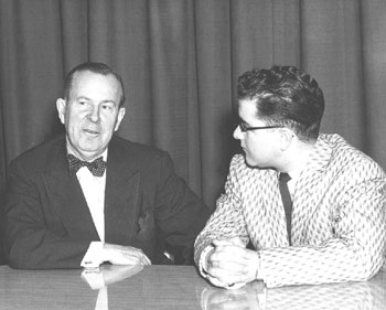 Prime Minister Lester B. Pearson being interviewed in studio by reporter Don Hoskins